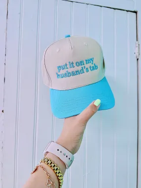 Put it on my husband’s tab hat