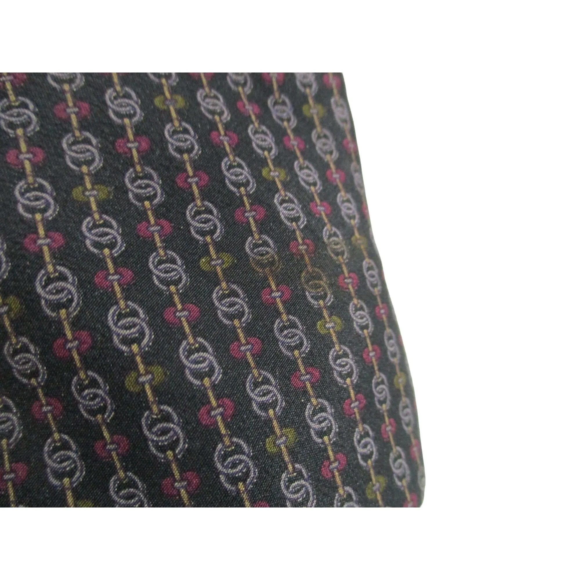 vintage Celine tie made of 100% silk with a logo print in shades of blue with green and red/pink.